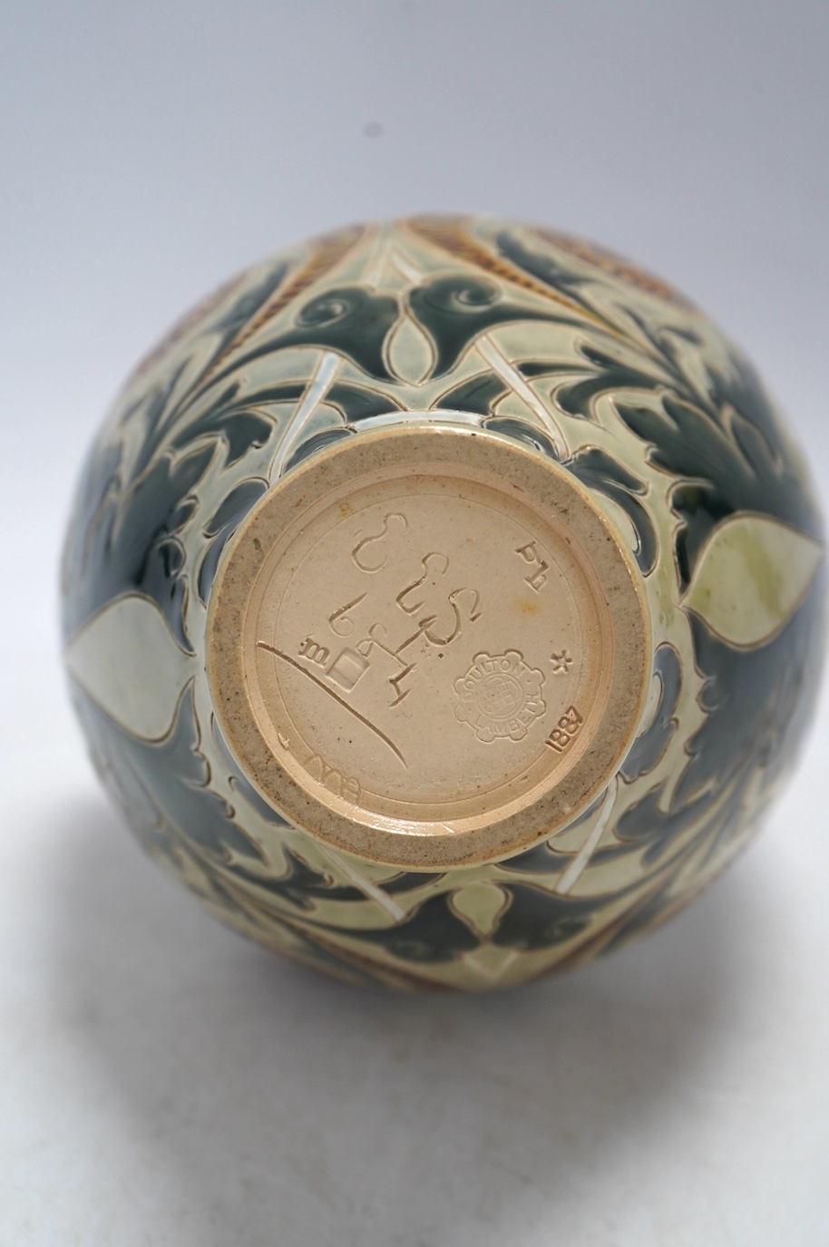 A Doulton Lambeth vase by Stormer, monogrammed and dated 1887, 20.5cm high. Condition - good